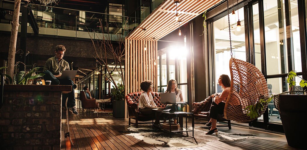 Wide angle shot of business people in modern office