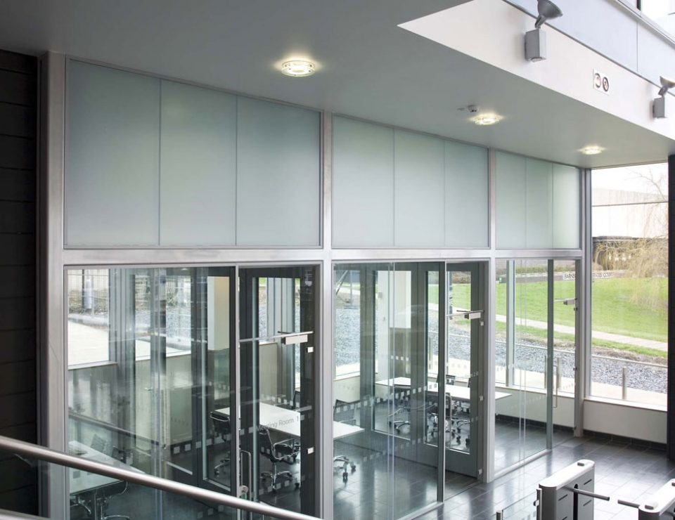 These partition doors integrate well with glass partitioning systems